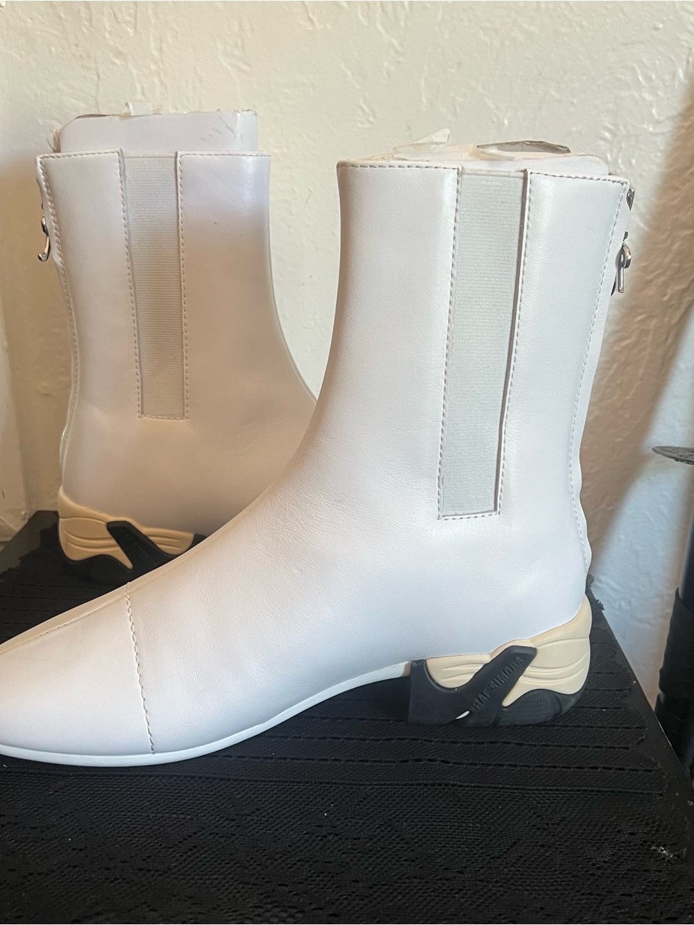 Raf Simon’s Solaris white boots